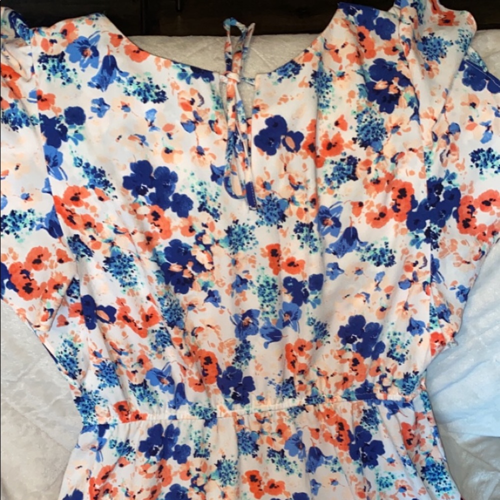 Knee length white floral dress with keyhole back